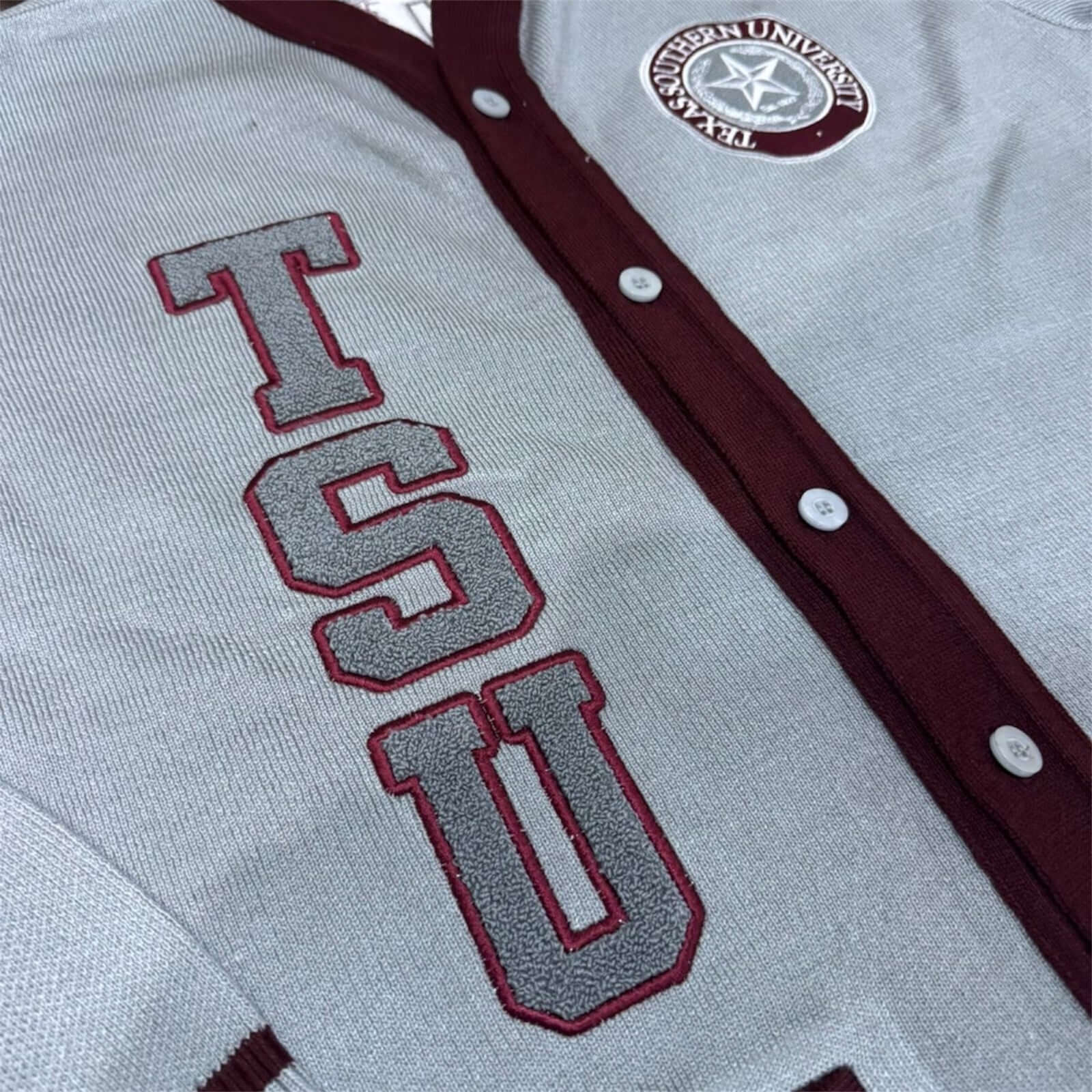 TEXAS SOUTHERN UNIVERSITY CARDIGAN SWEATER featuring TSU logo and maroon accents.